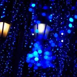 Street lanterns and blue Christmas lights